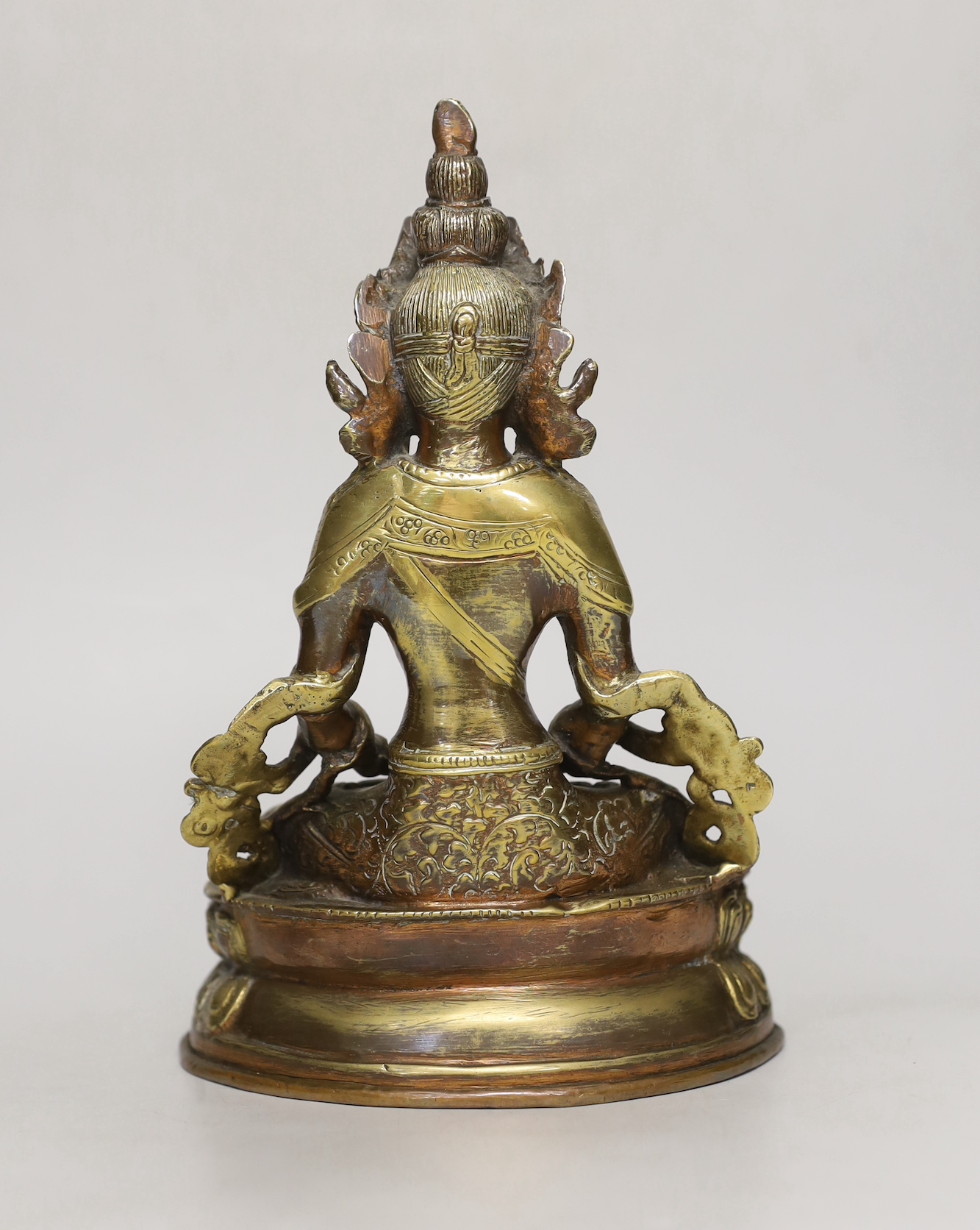 A Buddhist gilt copper alloy figure of a Bodhisattva, 22cm high